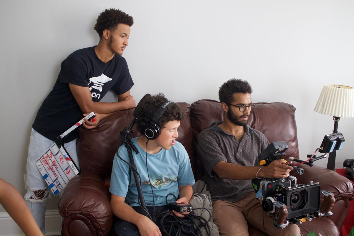 (L to R) Producer Ojo Akinlana, producer Mose Mayer, and director Phillip Youmans on the set of 'Burning Cane' phillip youmans burning cane