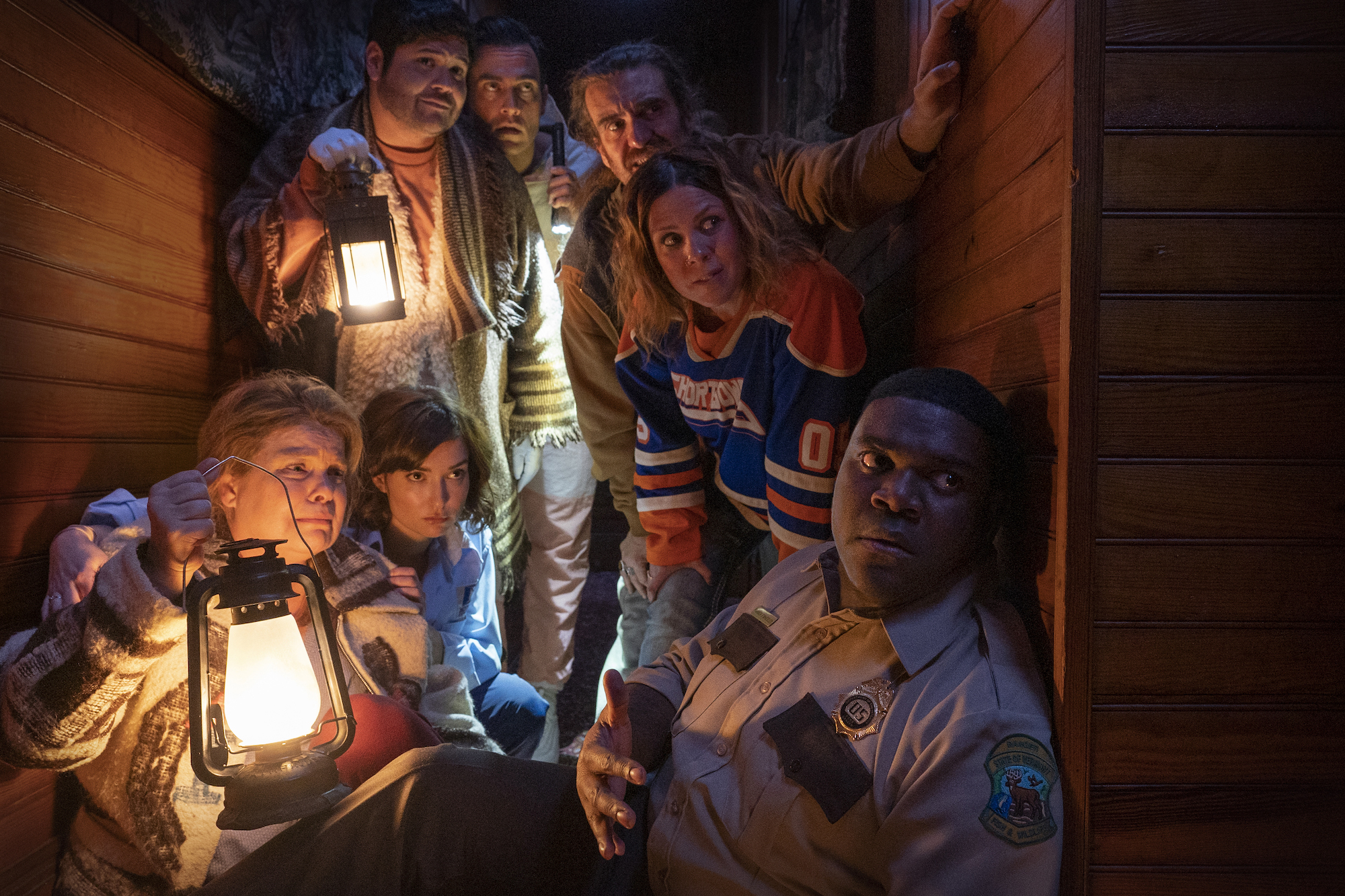 (Clockwise from lower right) Sam Richardson, Milana Vayntrub, Catherine Curtin, Harvey Guillen, Cheyenne Jackson, George Basil and Sarah Burns in 'Werewolves Within' (photo courtesy IFC Films) werewolves within cast